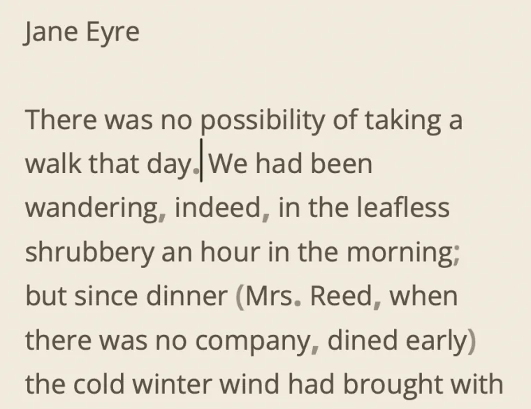 The opening of Jane Eyre on a warm paper tint: brown-gray text on a cream page.